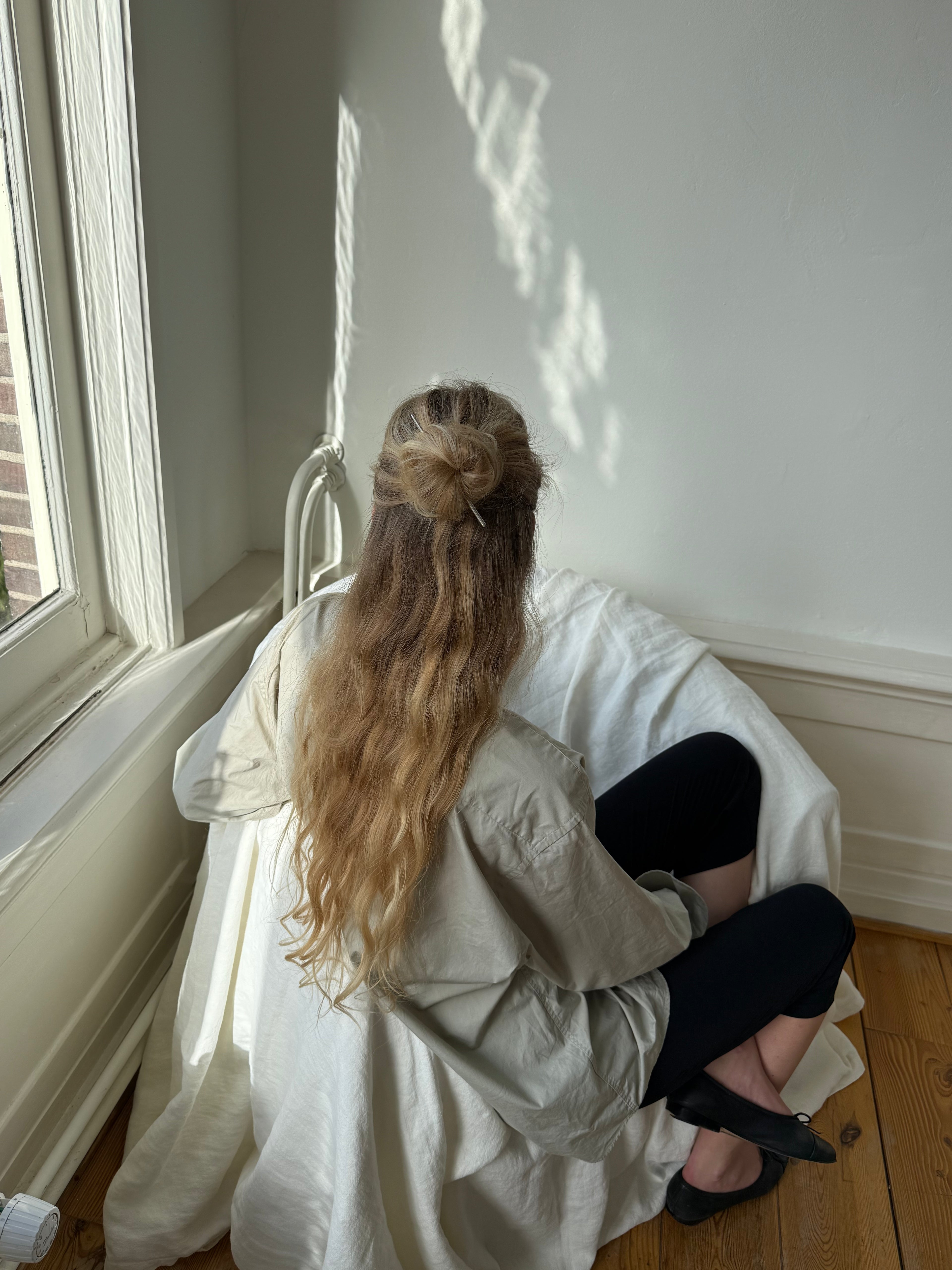 Woman with Blond hair half up half down with Sterling Silver Hairpin